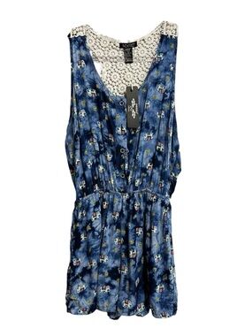 Indero blue tie-dye romper with a white lace back and elephant pattern. Jr M